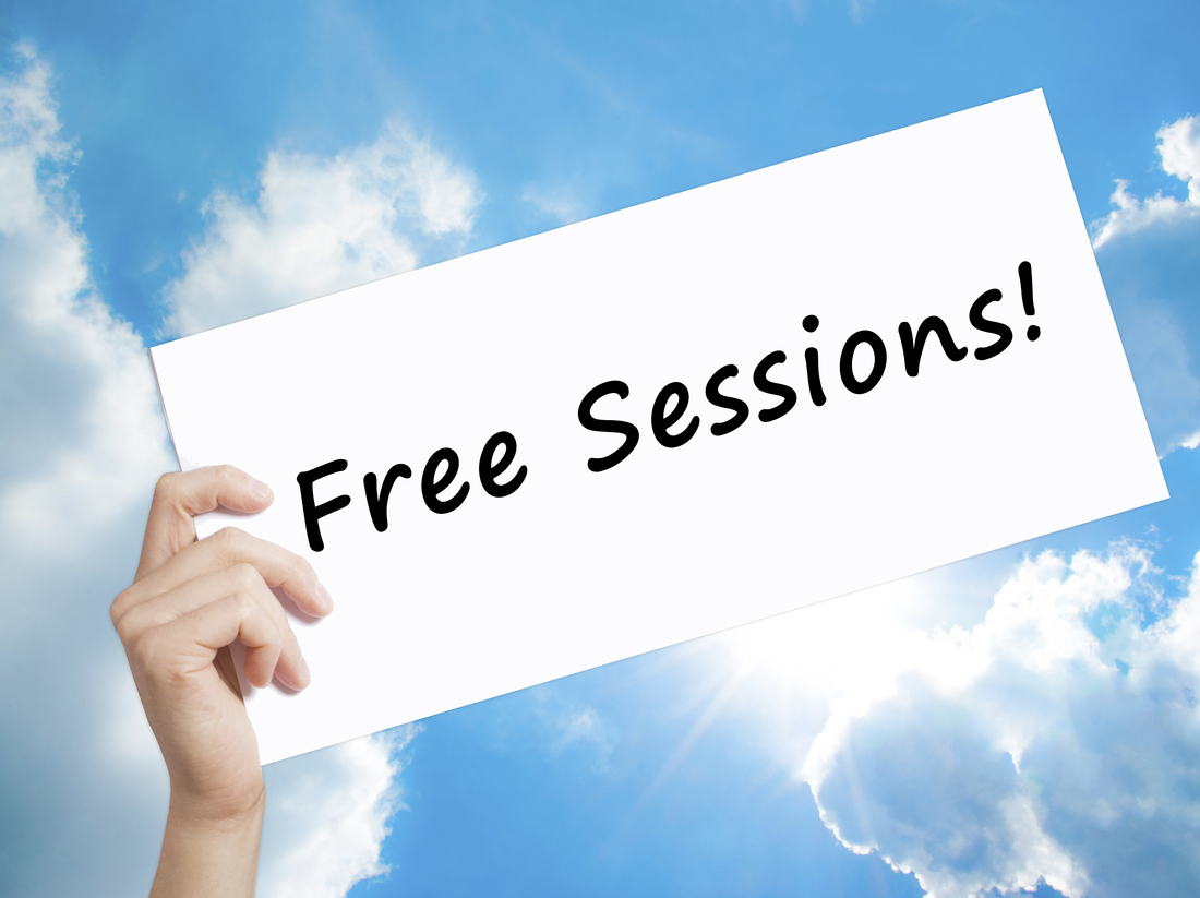 Free Consultation Sign On White Paper. Man Hand Holding Paper Wi
